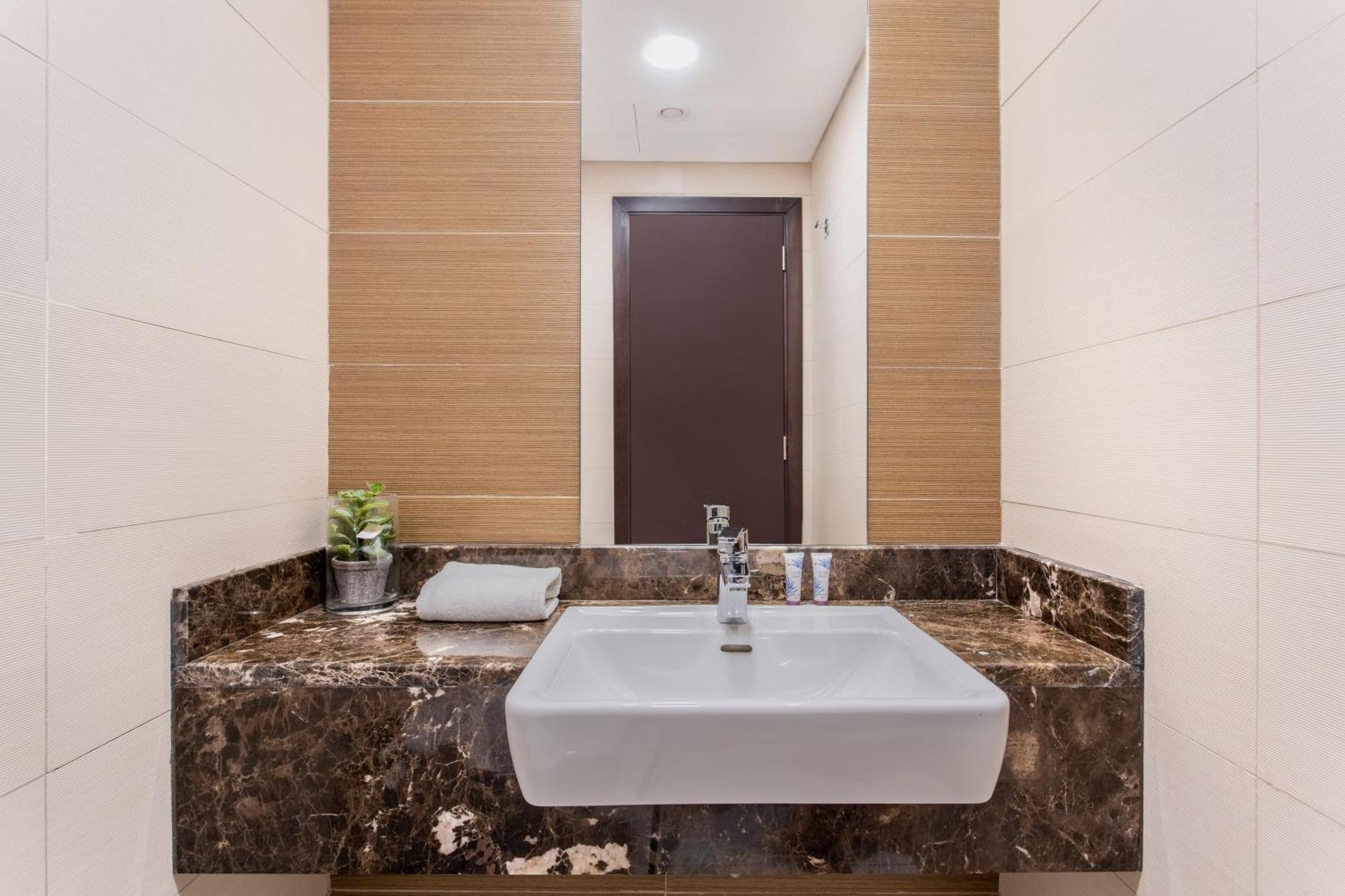 Icon Casa Living - Sparkle Tower 1 Daire Dubai Dış mekan fotoğraf